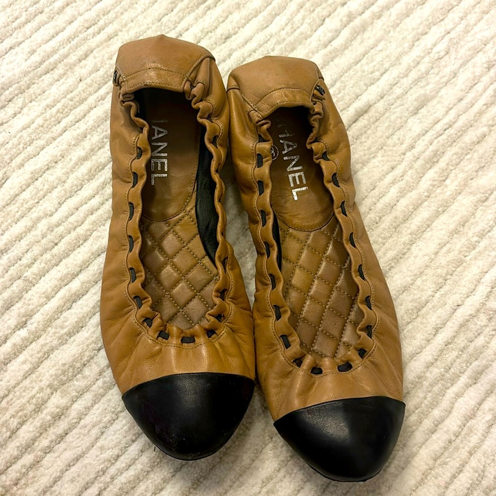 Chanel ballet style flats.  Tan with black toe. Size 38